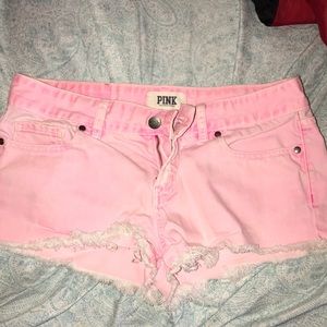 PINK denim shorts.